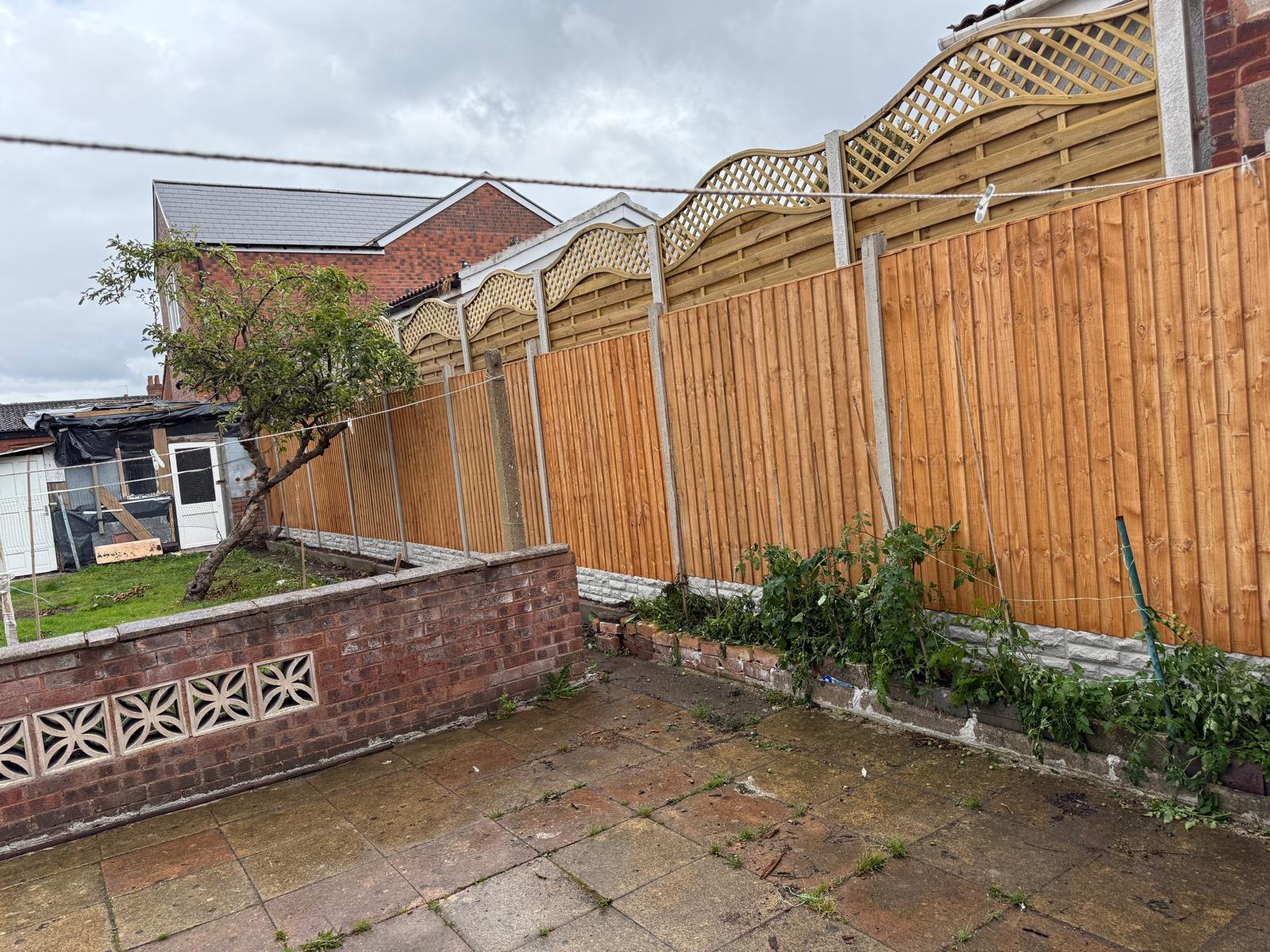 Fence after installation by DC Tree Care